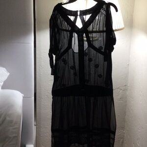 Stylish Black Sheer Dress with Floral Accents